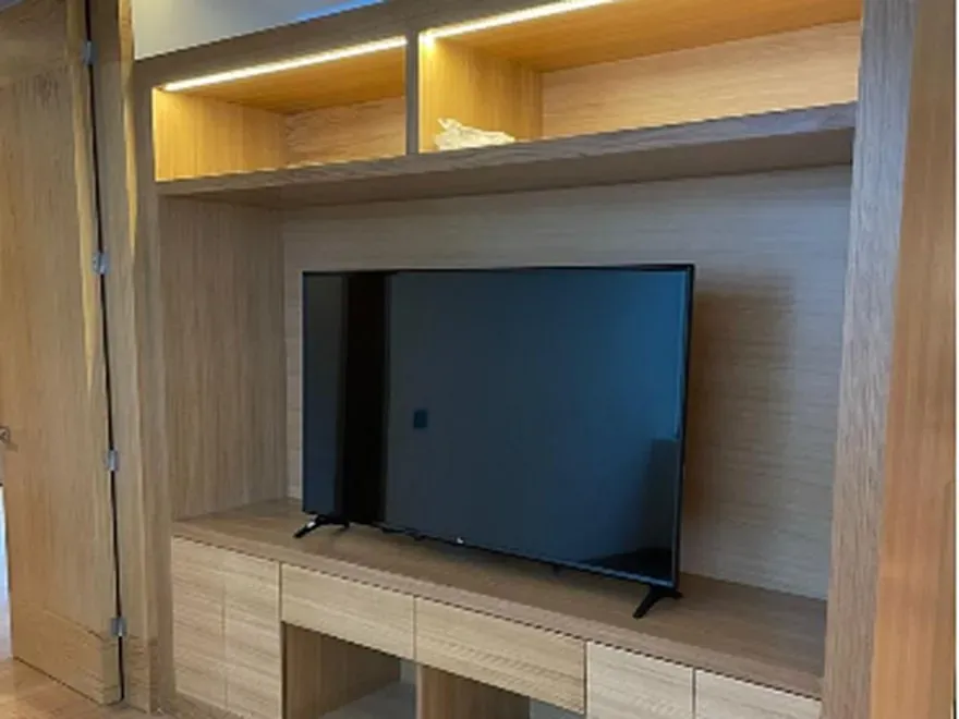 Mueble a la medida exacta del muro, en melamínico y madera